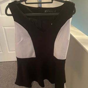Black and white peplum top.